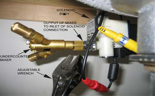 Connect the two faucet wires with the solenoid wires. The connectors are color coded.