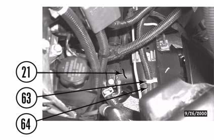 Remove bolt (54) and clip (55) and slide upper steering shaft (56) up to separate from lower shaft (57).