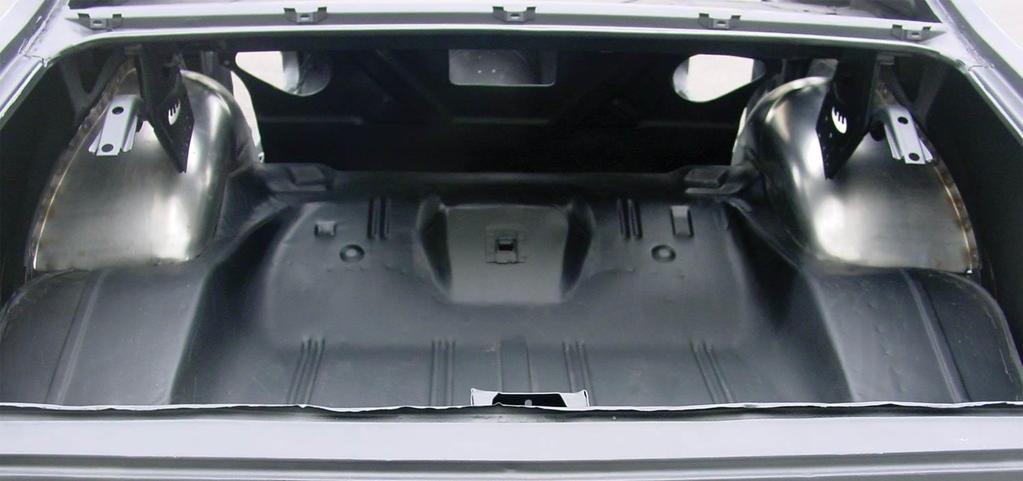 77. Re-cover the seat bottom and then reinstall the package tray, rear interior quarter trim panels, carpet padding, carpet, seats, gas tank, and any additional interior panels that were removed for