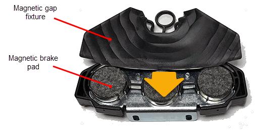5 Replacement Procedures Brake Pad Replacement 4. Repeat the procedure to remove the right brake pad. Installation 1. Mount a magnetic gap fixture onto the left and right brake pads.