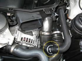 There are three rubber grommets underneath the air box holding it in place, one in front and two in back. To remove the air box, you will need to pull up on the air box itself.