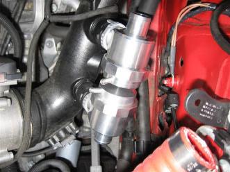 You can now completely remove the valves and hoses from the engine bay. 10.) With the factory diverter valves and hose out of the car, it is now time to install your Forge Motorsport diverter valves.