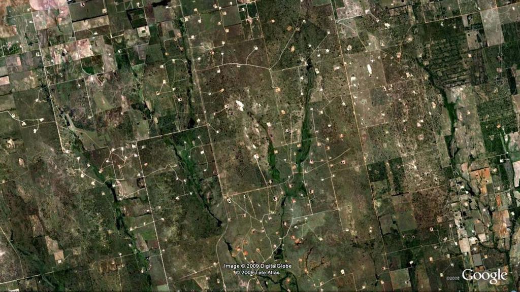 Gas well pads in Oklahoma 1 Mile Those white