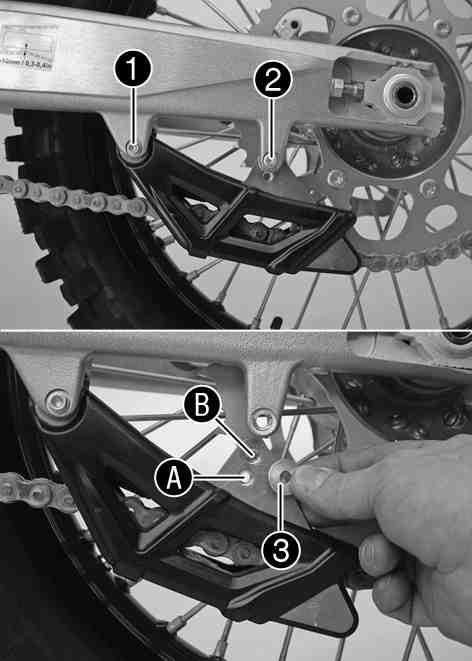 MAINTENANCE WORK ON CHASSIS AND ENGINE 42 Loosen nut. Loosen nuts. Adjust the chain tension by turning the adjusting screws to the left and right. Chain tension 8 10 mm (0.31 0.