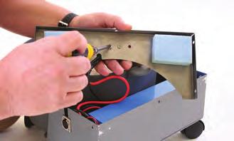 To access the battery pack, remove the 4 screws from the lid of the battery