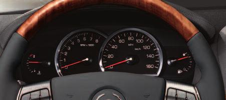 S R X INSTRUMENT PANEL CLUSTER A B C D A. Engine Coolant Temperature Gage B. Tachometer C. Speedometer D. Fuel Gage Note: Some of the gages and indicators may differ from the illustration presented.