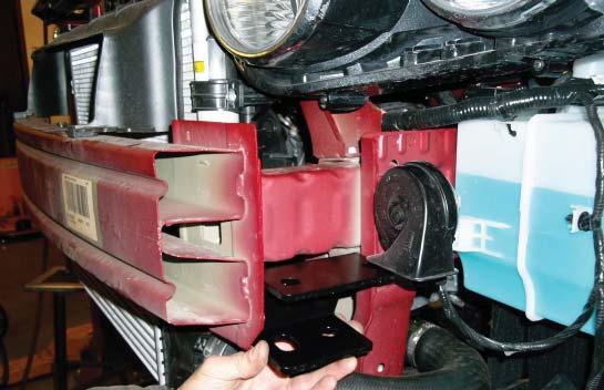 Due to manufacturing variances, the vehicle may be equipped with a plastic radiator liner. If this is the case, Fig.