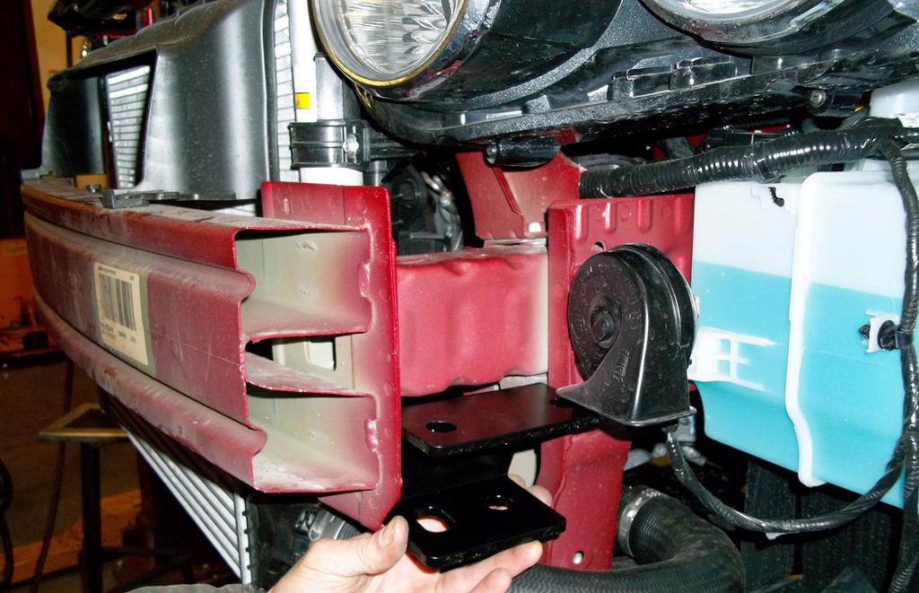 Due to manufacturing variances, the vehicle may be equipped with a plastic radiator liner.