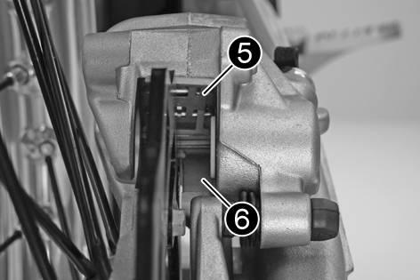 Make sure when pushing back the brake piston that you do not press the brake caliper against the spokes. 101740-10 Remove cotter pins 3, pull out pin 4, and remove the brake linings.