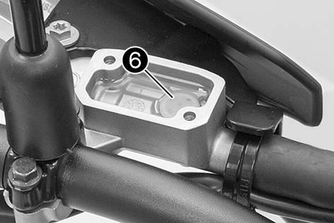 Move the clutch fluid reservoir mounted on the handlebar to a horizontal position. Remove screws. Remove cover with membrane.
