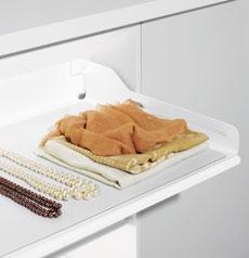 Extendo 1 Extendo 2 11 Understated elegance from the kitchen to the living room 3 This discreet pull-out shelf blends in