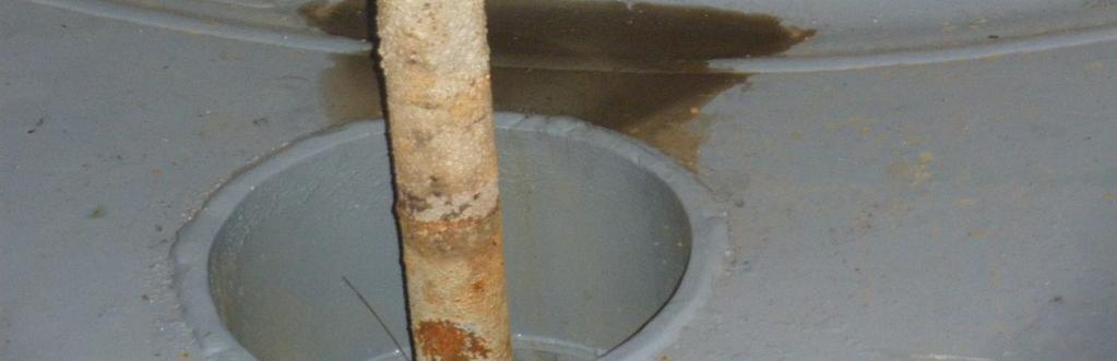 40) Severely corroded pipe, which requires immediate repair