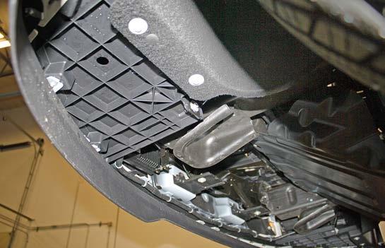Note: due to manufacturing variances, there may be six or eight plastic fasteners attaching the radiator cover instead.