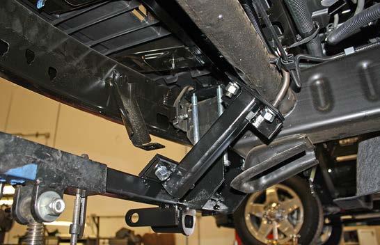 Note: make certain that the gusset of the rear brace faces to the outside of the vehicle.