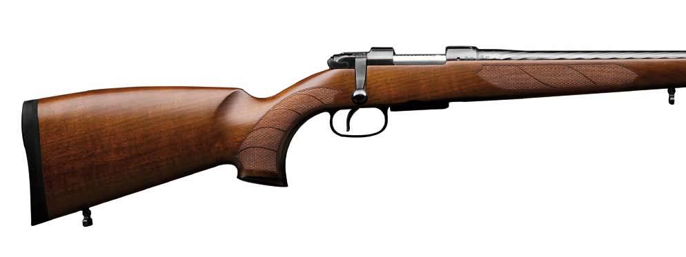 The stock and pistol grip are of modern style made of luxury walnut tipped with ebony wood.