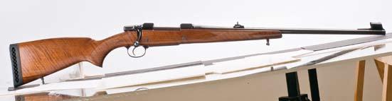 This rifle is provided with a short extractor and side magazine release. The stock made of high-grade walnut wood bears a new shape.