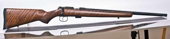 10 CZ 453 VARMINT The CZ 452-2E ZKM Varmint model version with completely new trigger mechanism featuring a set trigger guarantees very comfortable and accurate shooting..22 LR,.17 HMR Walnut stock.