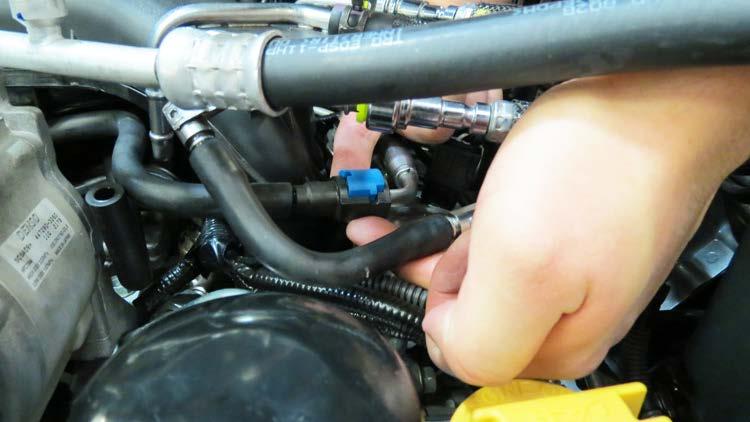 Using a 12mm socket, remove two (2) bolts securing the driver side manifold support bracket to the engine.