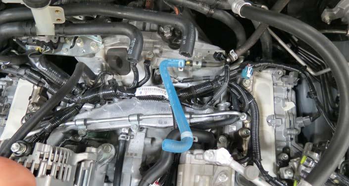 72. Install the supplied brake booster hose, with the end that says brake booster, onto