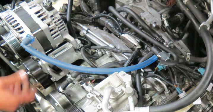84. Connect the EVAP hose to the EVAP solenoid and secure with a supplied hose clamp.