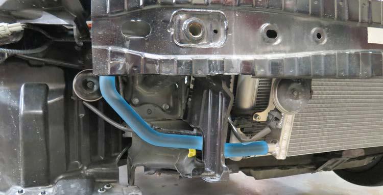 103. Secure the LTR-to-Intercooler Hose to the lower LTR fitting with a