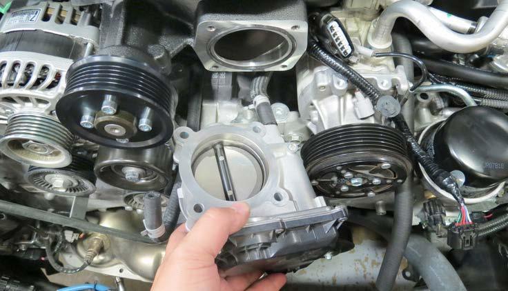 Install the O-ring seal onto the supercharger throttle body flange.