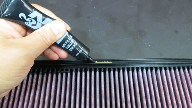 Install the air filter into the front air box shroud. 151.