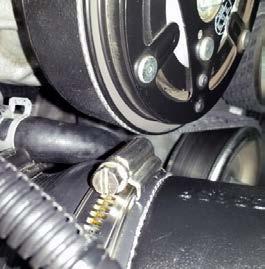 157. Connect the previously installed driver side PCV hose to the 1/2 barb