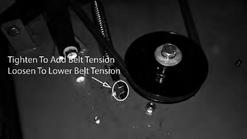 Spring tension adjustments can be made by sliding the bolt shown above forward or backward in the slot of the deck. Belt tension should be 60-65 lbs.