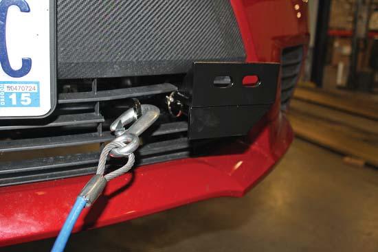 Install the tow bar to the mounting bracket according to the manufacturer's instructions. IMPORTANT! Safety cables are required by law.