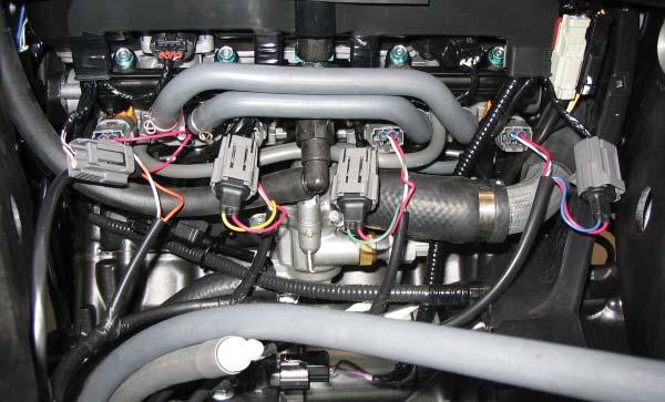 FIG.D 9 Attach the connectors from the PCFC to the stock wiring harness and stock fuel injectors as shown in Figure D.