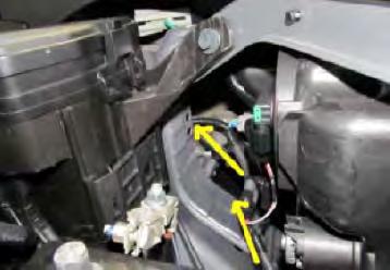 18. Run wire harness from driver s side fog light area