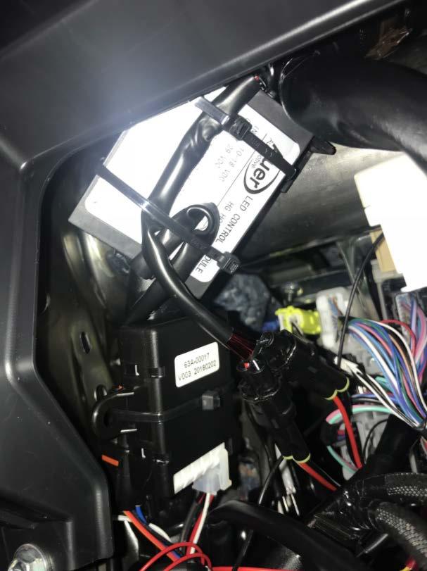 Using a 14 wire tie, secure the driver box to factory harness with the single connector on top.