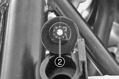 MAINTENANCE WORK ON CHASSIS AND ENGINE 107 Turn the adjusting wheel until the desired digit is next to marking. Info Position 0 has no function. 700198-01 Set the Map Select switch to Soft.