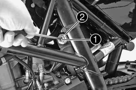 MAINTENANCE WORK ON CHASSIS AND ENGINE 66 Turn the adjusting screw clockwise with a screwdriver up to the last perceptible click. Info Do not loosen nut!