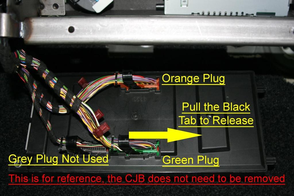 access): Reach up behind the CJB and remove 2 of the 3 plugs, Orange and Green.