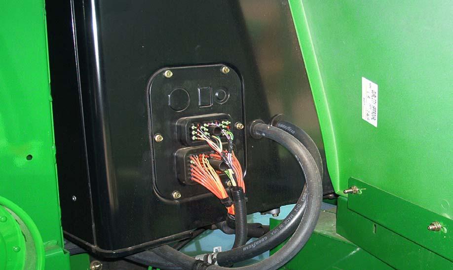 Cable Entry into Cab Warning: Before drilling any holes check the other side of the panel for cables and other parts that can be damaged by the drill. Left Side of Cab 1.