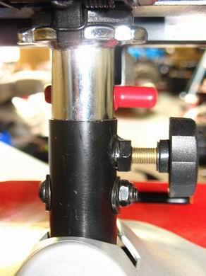 Reinstall the seat height adjustment pin through the seat post and armrest post. (Bend the end of the pin lock and position it over the end the pin.) 7.