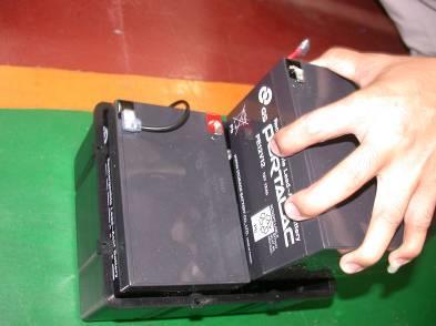 Connect the red cable to the positive(+) battery terminal and black cable to the negative(-) on the
