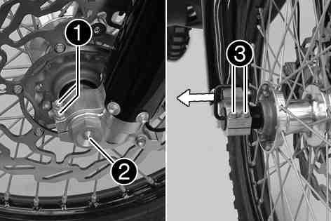 Take the front wheel out of the fork. Do not pull the hand brake lever when the front wheel is removed. Always lay the wheel down in such a way that the brake disc is not damaged.