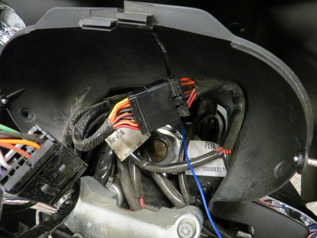 PIC 8 STEP 21 Apply some of the included dielectric grease to each end of the wiring adapter and plug it into the OEM harness.