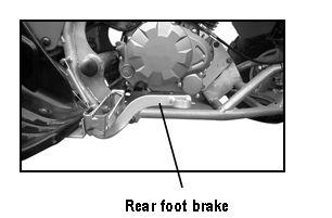 Parking Brake---Parking brake is applied by squeezing front brake lever then pushing parking brake pin in place.