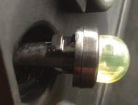 Unscrew oil strainer cap 1.