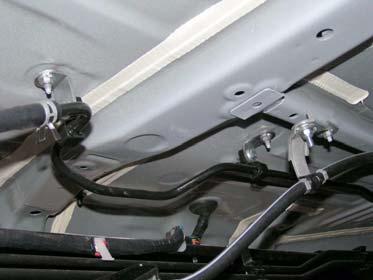 b. Install fuel line and two brackets onto two kit brackets (L-shaped) with two kit