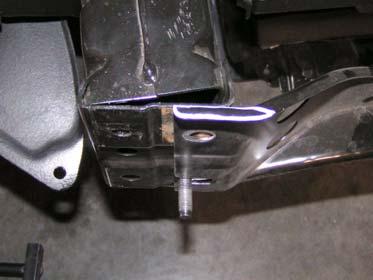 Align holes of two kit brackets (front bumper) with bumper crush support and mark two