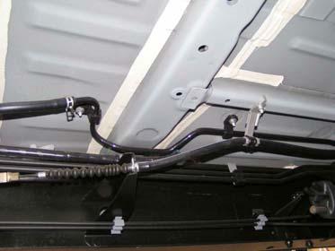 Parking Brake Cable Heat Shield Parking Brake Bracket & Rear of Vehicle 1. Fuel filler a.