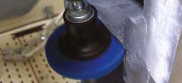 MOUNTING TR: Roll-on/roll-off system using a nylon threaded male button on a pad (TR) with spindle.