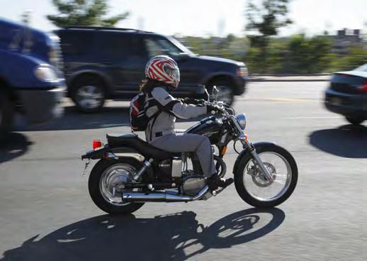 Before changing lanes, check to see if a motorcyclist, scooter operator or bicyclist is in your blind spot or in the space where you plan to move.