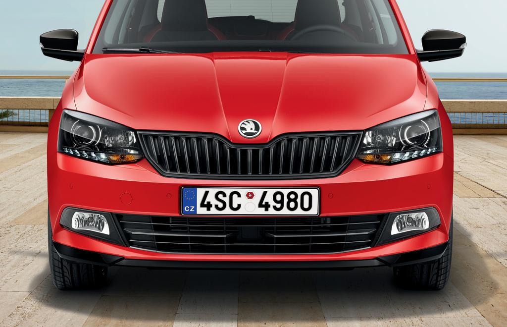 BRING OUT THE RED TUXEDO The FABIA model always radiates strength and confidence.