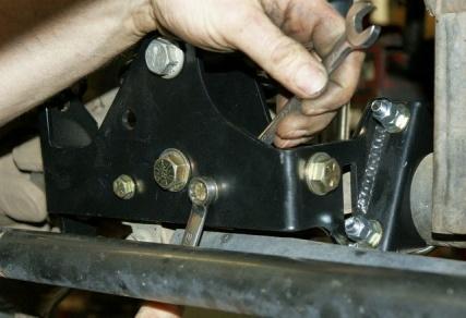 Insert the shorter ½ bolt with washers and nut for the side bolting the two pieces together. Locknuts.